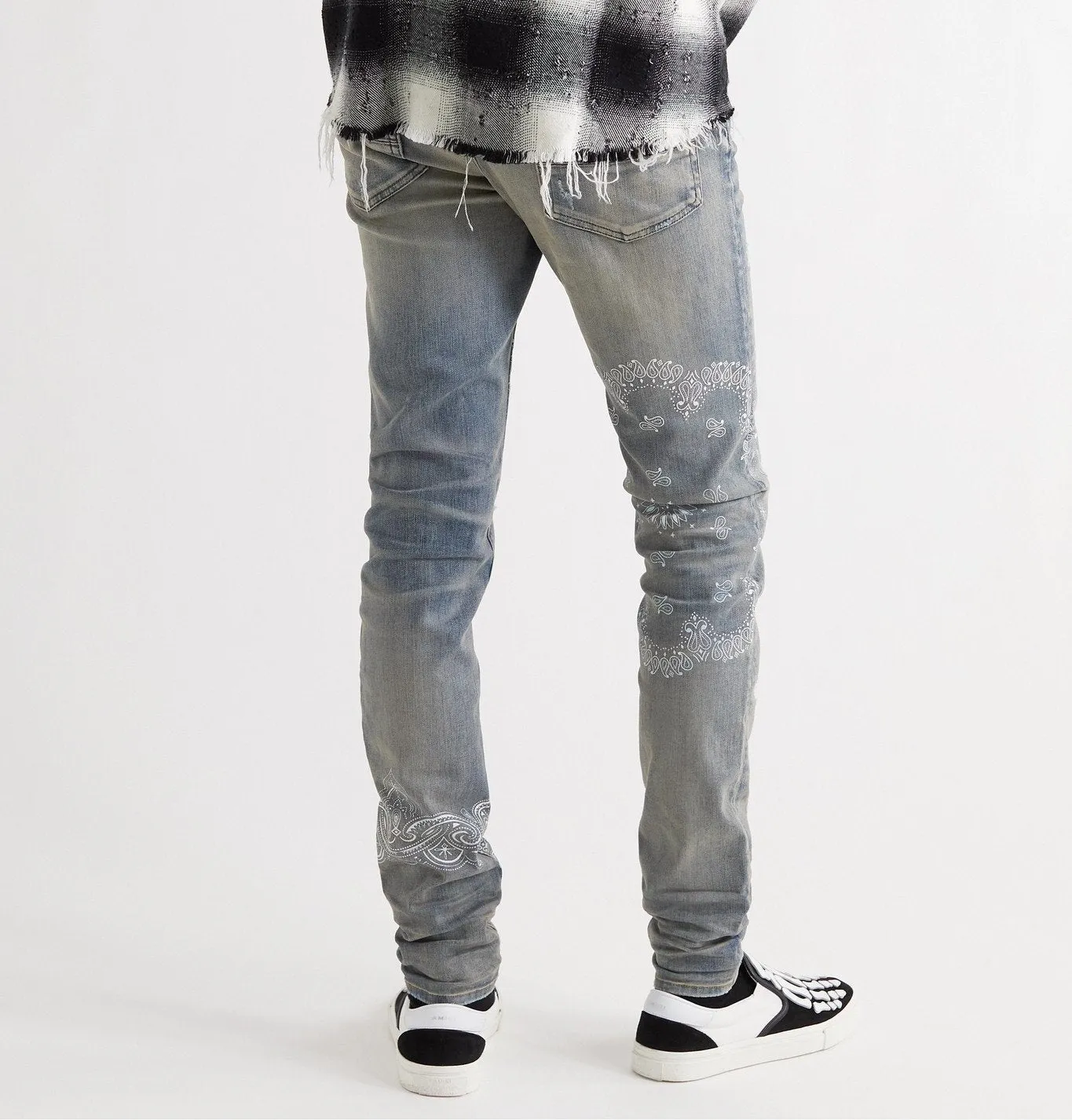 AMIRI DISTRESSED SCREEN PRINT BANDANA JEANS